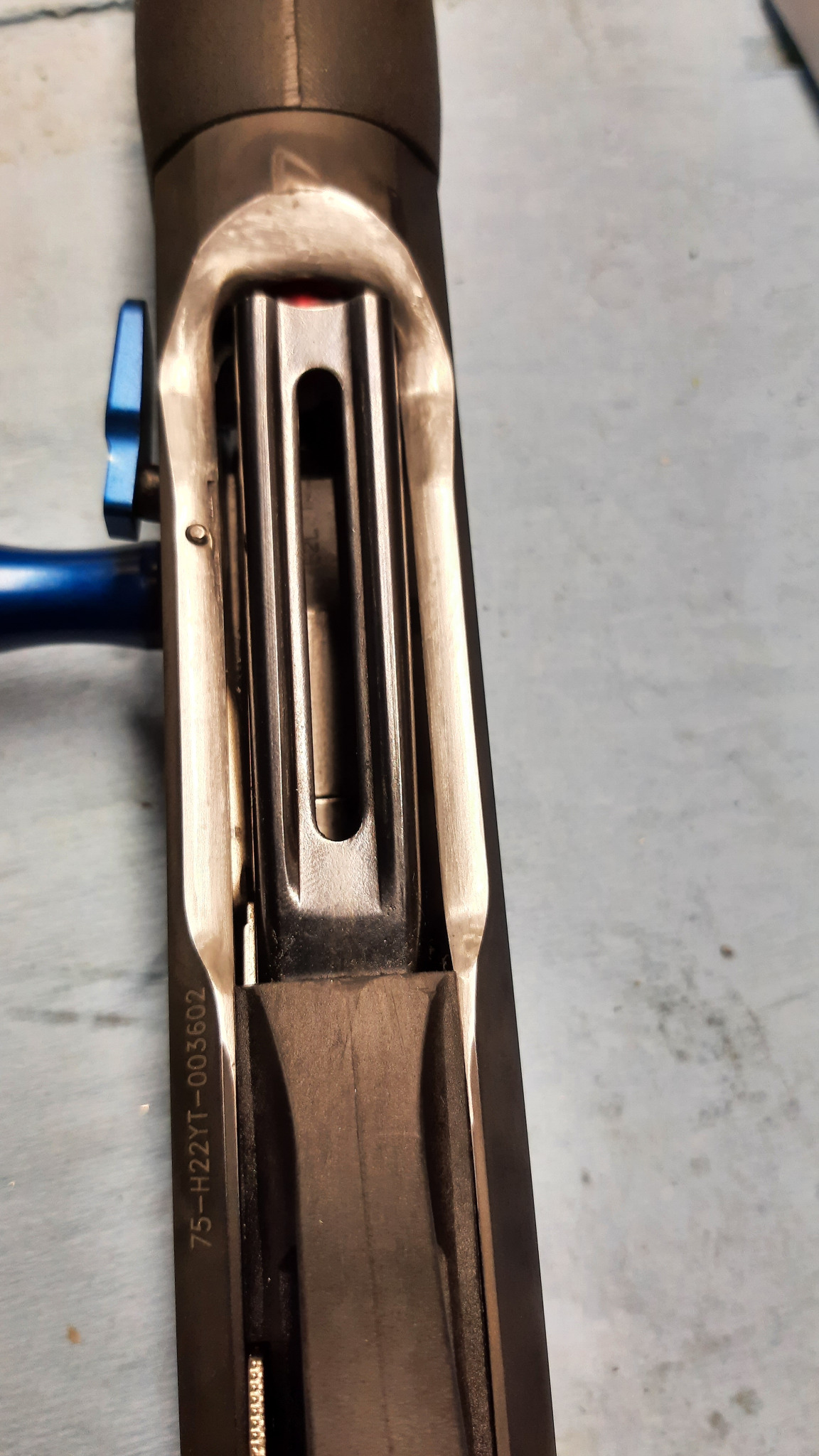 Hand-contoured Benelli loading gate and loading port